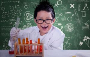 infant development leads to a child engaging in a science experiment